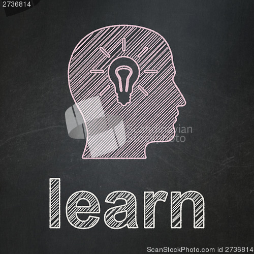 Image of Education concept: Head With Light Bulb and Learn on chalkboard