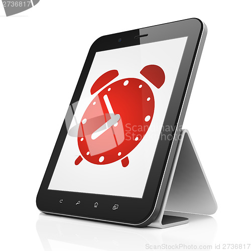 Image of Time concept: Alarm Clock on tablet pc computer