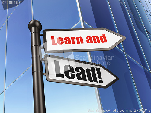 Image of Education concept: sign Learn and Lead! on Building background