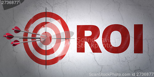 Image of Business concept: target and ROI on wall background