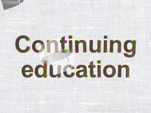 Image of Continuing Education on fabric background