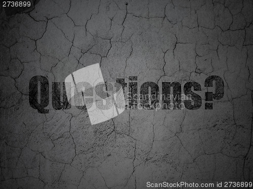 Image of Education concept: Questions? on grunge wall background