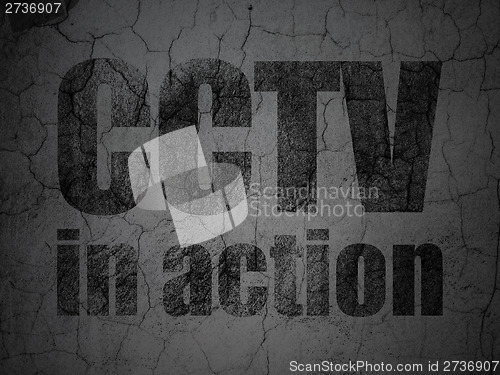 Image of Safety concept: CCTV In action on grunge wall background