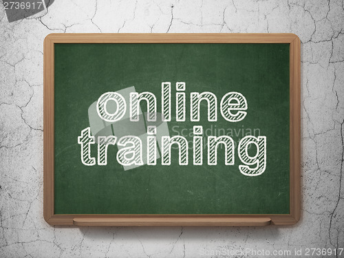 Image of Education concept: Online Training on chalkboard background