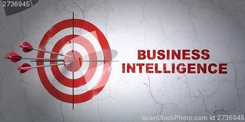 Image of Finance concept: target and Business Intelligence on wall