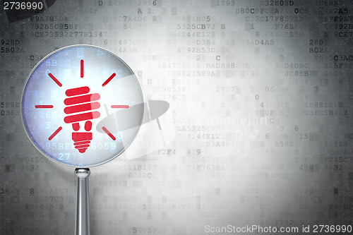 Image of Finance concept:  Energy Saving Lamp with optical glass