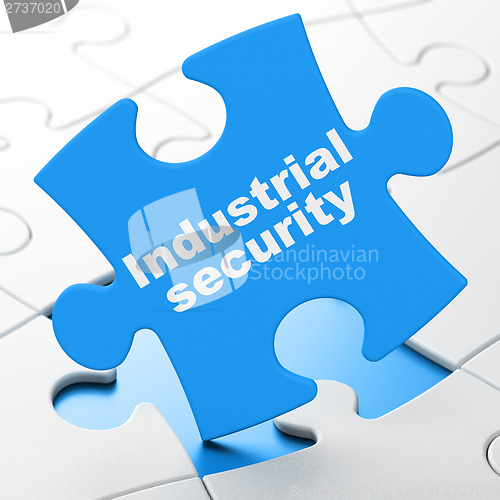 Image of Protection concept: Industrial Security on puzzle background