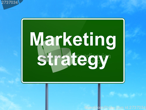 Image of Advertising concept: Marketing Strategy on road sign background