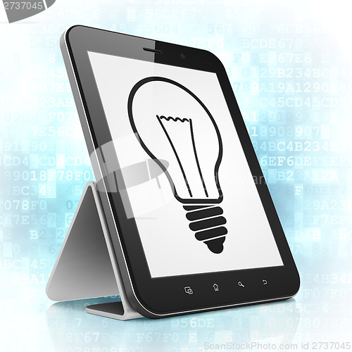 Image of Finance concept: Light Bulb on tablet pc computer