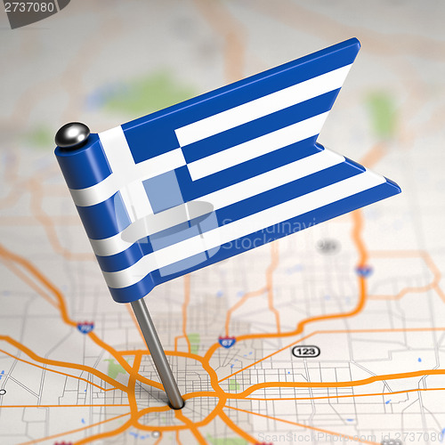 Image of Greece Small Flag on a Map Background.