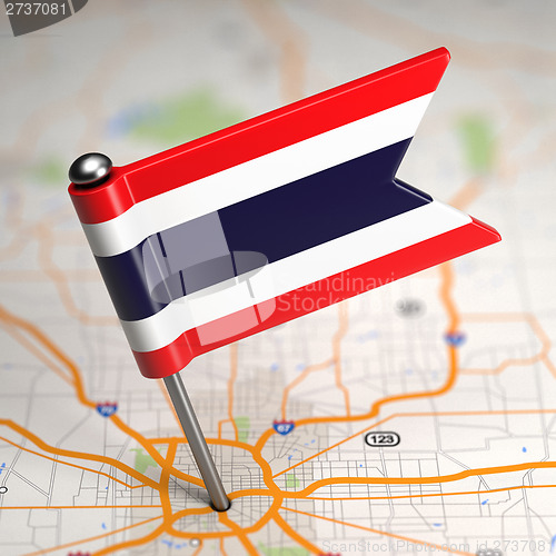 Image of Thailand Small Flag on a Map Background.