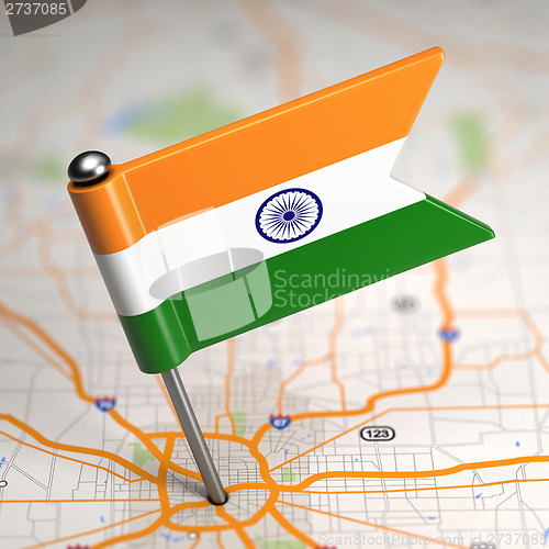 Image of India Small Flag on a Map Background.