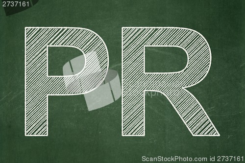 Image of Advertising concept: PR on chalkboard background