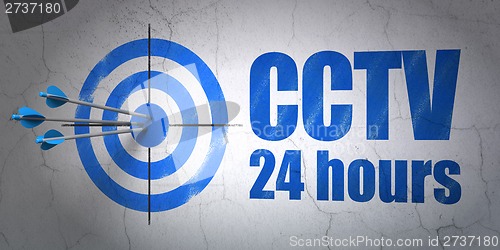 Image of Security concept: target and CCTV 24 hours on wall background