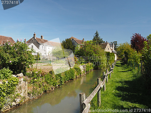 Image of Montresor village, grass path along the Indrois  France