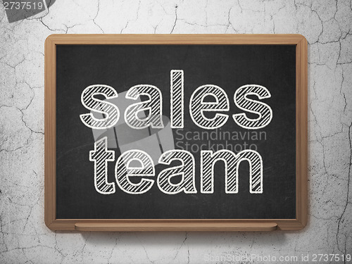 Image of Marketing concept: Sales Team on chalkboard background