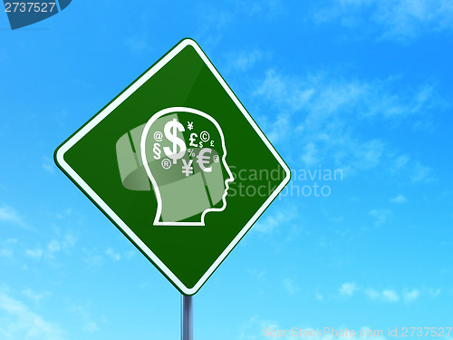 Image of Marketing concept: Head With Finance Symbol on road sign