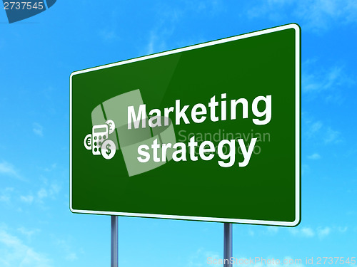 Image of Advertising concept: Marketing Strategy and Calculator on sign