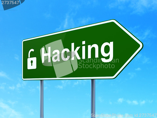 Image of Protection concept: Hacking and Opened Padlock on road sign
