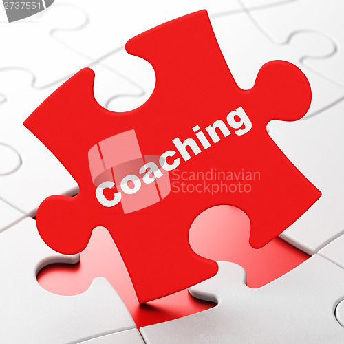 Image of Education concept: Coaching on puzzle background