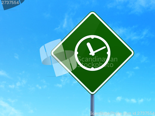 Image of Timeline concept: Clock on road sign background