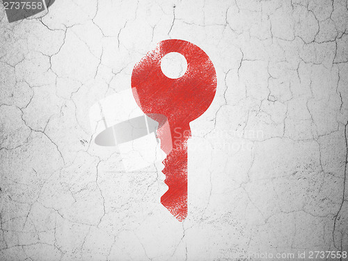 Image of Protection concept: Key on wall background