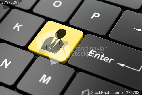 Image of Business Man on computer keyboard background