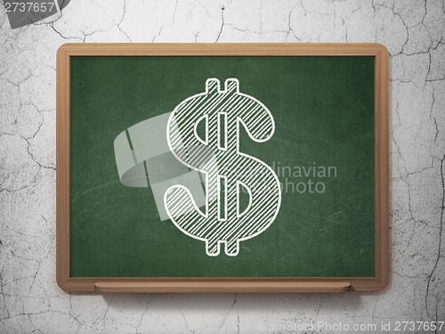 Image of Currency concept: Dollar on chalkboard background