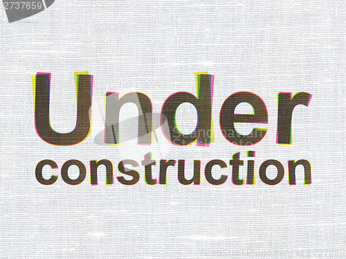 Image of Web design concept: Under Construction on fabric background