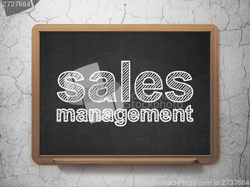 Image of Marketing concept: Sales Management on chalkboard background