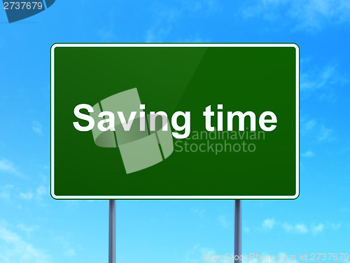 Image of Saving Time on road sign background