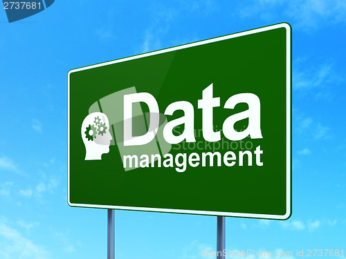 Image of Data Management and Head With Gears on sign