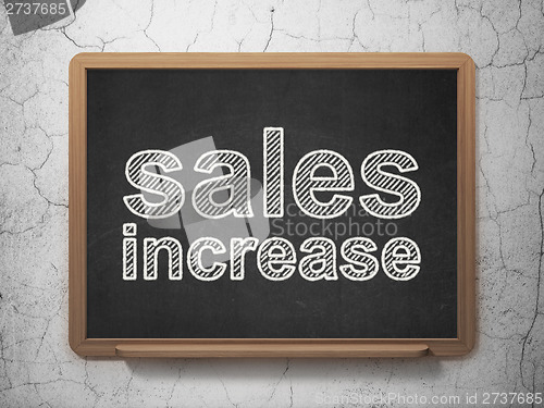 Image of Advertising concept: Sales Increase on chalkboard background