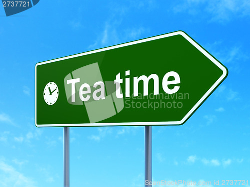 Image of Time concept: Tea Time and Clock on road sign background