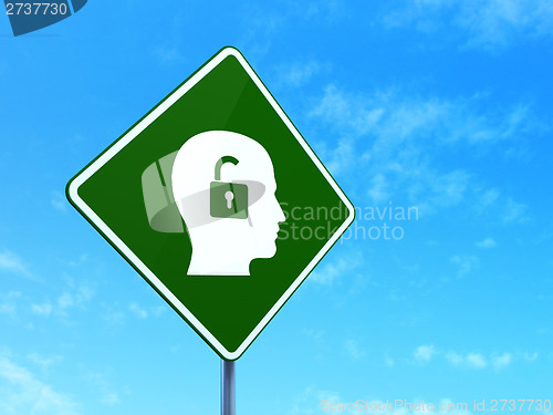 Image of Business concept: Head With Padlock on road sign background