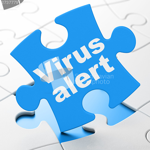 Image of Privacy concept: Virus Alert on puzzle background