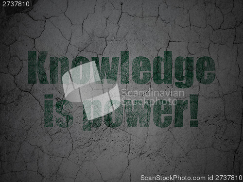 Image of Education concept: Knowledge Is power! on grunge wall background