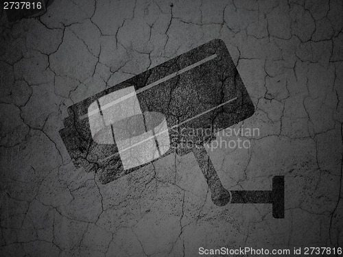 Image of Security concept: Cctv Camera on grunge wall background