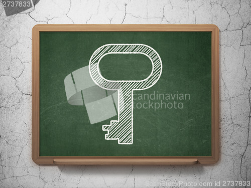 Image of Privacy concept: Key on chalkboard background