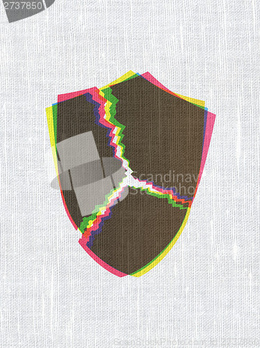 Image of Safety concept: Broken Shield on fabric texture background