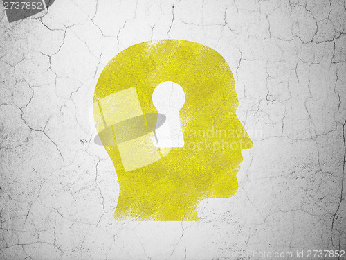 Image of Data concept: Head With Keyhole on wall background