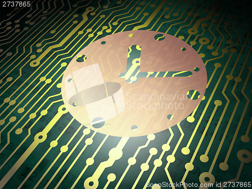 Image of Time concept: circuit board with Clock