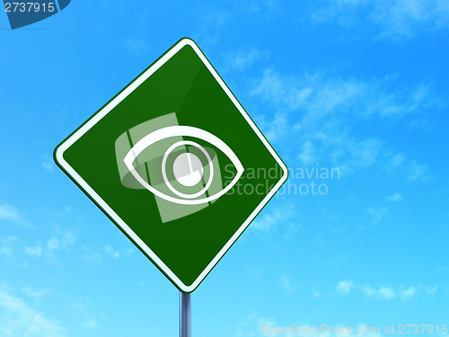 Image of Security concept: Eye on road sign background