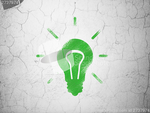 Image of Finance concept: Light Bulb on wall background
