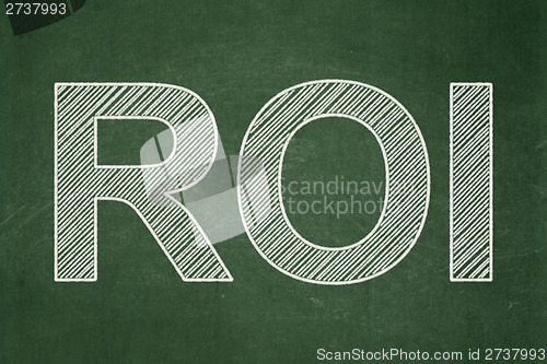 Image of Finance concept: ROI on chalkboard background