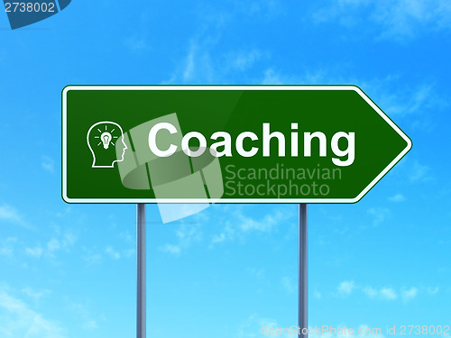 Image of Education concept: Coaching and Head With Lightbulb on sign