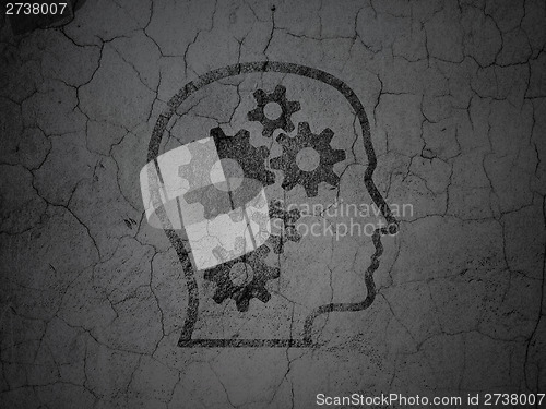 Image of Finance concept: Head With Gears on grunge wall background