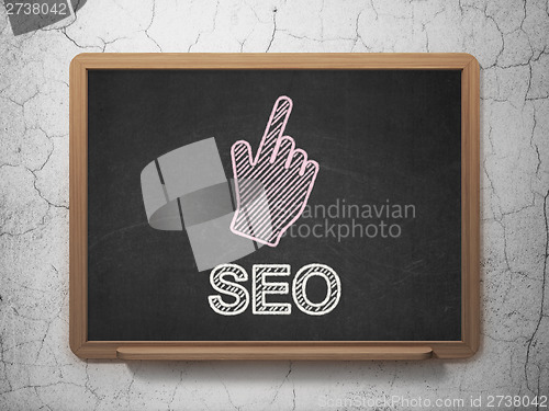 Image of Web development concept: Mouse Cursor and SEO on chalkboard