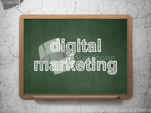 Image of Advertising concept: Digital Marketing on chalkboard background