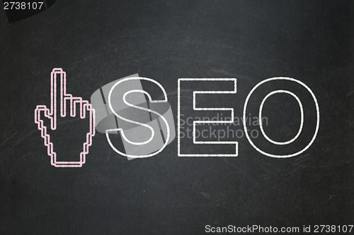 Image of Web development concept: Mouse Cursor and SEO on chalkboard